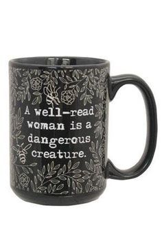 a black coffee mug with words on it