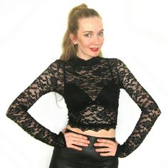 NWT Black Lace Long Sleeve Crop Top Size - Fabric content - 92% nylon, 8% spandex   - Care - hand wash cold, do not bleach, dry flat, do not iron   - Made in USA   - Will ship the same day if bought mon-friday before 2pm PST or next day if bought after 2pm PST Tops Crop Tops White Sleeveless Crop Top, Sparkly Crop Tops, Hollister Crop Tops, American Eagle Crop Top, Red Lace Top, Zara Crop Top, Lace Long Sleeve, Crop Top Shirts, Lace Crop Tops