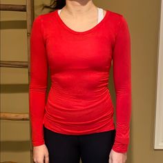 New Red Long Sleeve Tight Shirt/Undershirt. Light- Weight, Body Fitting. Can Be Used To Wear Under Sweaters/Sweatshirts Or Worn Alone. Letter Sizes Are Not Listed On The Product- But The Translation Is 38 (S), 40 (M), 42 (L), 44 (Xl). Person In The Picture Is 5 Foot 5 Inches And 120 Pounds And Wears A 38 (S). It Is Form Fitting- If You Are Smaller Than That A S Will Still Fit You. Additional Colors Available On My Profile! Fitted Red T-shirt For Fall, Fitted Long Sleeve Basic T-shirt, Basic Fitted Long Sleeve T-shirt, Basic Long Sleeve Fitted T-shirt, Red Fitted Long Sleeve T-shirt, Solid Color Long Sleeve Snug Fit Tops, Casual Fitted Tops With Thumbholes, Fitted Red Long Sleeve Tops, Red Stretch T-shirt For Fall