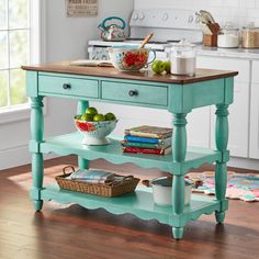 a kitchen island with two drawers and shelves