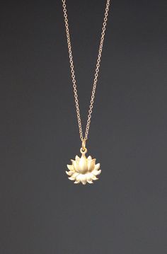 A stunning 24k matte gold vermeil Lotus flower charm simply dangles from a 14k gold filled chain. Choose from a 1mm 14k gold filled chain with a gold spring ring clasp, or a 1.5mm 14k gold filled chain with a gold lobster clasp. Each chain measures 16" with an extension to 18".  Please send a message if a different length chain is desired. This elegant and lightweight go-with-everything necklace completes any outfit for daytime or evening.   Gold Plumeria flower charm: 15x16mm Total length of ch Minimalist 14k Gold Filled Jewelry With Flower Charm, Delicate Pendant Jewelry Chain For Meditation, Gold Flower Necklace In 14k Gold, Minimalist 22k Gold Jewelry For Gift, Minimalist 22k Gold Jewelry Gift, Minimalist Yellow Gold Flower Pendant Charm Necklace, 14k Gold Filled Flower Necklace, 14k Gold-filled Flower Necklace, Gold Flower Jewelry For Meditation