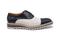 Leather Spectator Lace-Up Oxford Black/White Gorgeous lace-up Oxford from the Carrucci Collection in Smooth leather features a Cap-Toe, Double Stitched welt and a Tri Color Lightweight Rubber Sole! White Leather Oxfords For Office, White Leather Lace-up Shoes For Spring, White Plain Toe Lace-up Business Shoes, White Leather Lace-up Shoes For Office, Classic White Lace-up Office Shoes, White Oxfords For Spring, Fitted White Oxfords For Spring, White Cap Toe Oxfords For Spring, White Leather Lace-up Shoes For Business