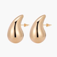 With these Bottega drop gold earrings, all that glitters is gold. Inspired by the iconic Italian fashion house Bottega Veneta, hand-finished, these statement earrings will add a touch of sophistication and glam to any outfit. The Bottega drop gold earrings feature a timeless design with delectably smooth edges and finishes. These are complemented with exquisite craftsmanship for a luxurious look that's guaranteed to turn heads. These earrings are fit for any occasion, effortlessly taking you fro Valentina Rose, Drop Gold Earrings, All That Glitters Is Gold, Smooth Edges, All That Glitters, Drops Design, Silver Drop Earrings, Fashion House, Elevate Your Look