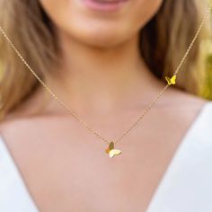 WHIMSICAL CHARM: Add a touch of whimsical charm with this dainty butterfly necklace. This piece is gorgeous on its own or perfect for layering with others. MEANINGFUL GIFT: The butterfly is a symbol that represents life, hope, and endurance. This is a wonderful, thoughtful gift for any woman and any occasion: mothers, daughters, bridesmaids, your girls’ squad, or friends. SUPERIOR QUALITY: This necklace is real 14k gold dipped with an adjustable chain and a lobster clasp. 14k gold plating mainta Mother's Day Butterfly Jewelry With Butterfly Charm, Mother's Day Jewelry With Butterfly Charm, Mother's Day Butterfly Charm Jewelry, Dainty Butterfly Charm Pendant Necklace, Dainty Pendant Necklace With Butterfly Charm, Mother's Day Jewelry Pendant With Butterfly Charm, Mother's Day Jewelry With Butterfly Pendant, Mother's Day Butterfly Charm Pendant Necklace, Mother's Day Butterfly Pendant Jewelry