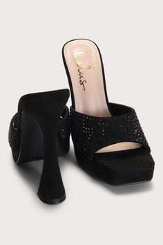 Shine brighter than any disco ball on the dance floor with the Lulus Karelee Black Suede Rhinestone Platform High Heel Sandals! The trendy slide-on silhouette has a soft faux suede composition, that shapes a square toe bed (atop a 0.75"" toe platform) and a wide, rhinestone-adorned toe strap with a curved collar. A towering pyramid heel completes the glitz and glam look! 5" wrapped pyramid heel. Cushioned insole. Felted rubber sole has nonskid markings. Man made materials. Imported. Lulus | Kare Synthetic Heels With Rhinestones For Party Season, Party Season Heels With Rhinestones In Synthetic Material, Party Season Synthetic Heels With Rhinestones, Black Sandals For Party Season Night Out, Crystal Embellished Heels For Party Season, Black Rhinestone Sandals For Prom, Sequin Heels For Night Out, Sparkling Synthetic Sandals For Night Out, Glamorous Synthetic Sandals For Night Out