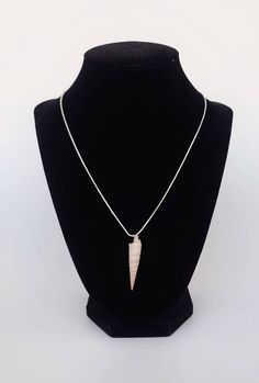 "Beautiful handcrafted real seashell necklace made with sustainably sourced and hand picked shells from local beaches in Florida. Light creme colored auger cone seashell attached to your choice of silver or gold chain.  3/4 to 1 inch length shells 18\" necklace chain length  2\" necklace chain length extension on gold chain selection  Please note that all shells are unique, and while each piece will look very similar to that pictures, fluctuations in the shell are to be expected. USAGE Our luxur Beaches In Florida, Work Function, Necklace Shell, Glam Jewelry, Cotton Jewelry, Silver Gift Wrap, Star Chain, Jewelry Dainty, Seashell Necklace