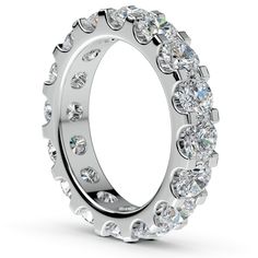 a wedding ring with lots of diamonds on it