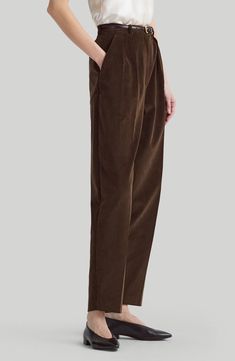 Tailored from plush corduroy, these tapered-leg pants feature reversed front pleats that create a relaxed fit. 27" inseam; 15" leg opening; 13" front rise; 16 1/2" back rise (size 42FR) Zip fly with button closure Front slant pockets; back button-welt pockets 100% cotton Dry clean Made in Italy Designer Clothing Corduroy Ankle-length Workwear Bottoms, Classic Corduroy Tapered Leg Bottoms, Corduroy Ankle-length Workwear Pants, Corduroy Ankle-length Pants For Work, Ankle-length Corduroy Pants For Work, Elegant Corduroy Bottoms For Work, Corduroy Tapered Leg Pants For Work, Tapered Leg Corduroy Pants For Work, Elegant Corduroy Bottoms For Fall