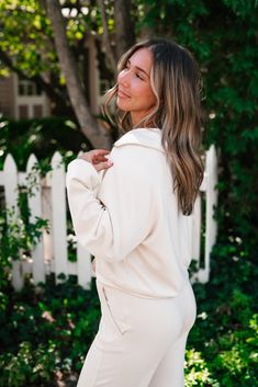 Introducing the End Of Summer Quarter Zip Top in Cream—the perfect transitional piece for those cooler days ahead. Featuring a classic quarter-zip design, this top blends style with functionality. The wide front pocket adds a casual, sporty touch, while the slight cropped fit keeps it modern and flattering. Whether you're layering it over a tank or pairing it with your favorite high-waisted jeans, this top is the ultimate mix of comfort and style. Stay cozy and chic as the seasons change with th Spring Half-zip Sweatshirt With Zipper Closure, Spring Sweatshirt With Zipper Closure For Loungewear, Half-zip Sweatshirt With Zipper Closure For Spring, Spring Half-zip Athleisure Sweatshirt, Fall Half-zip Loungewear Activewear, Solid Half-zip Outerwear For Loungewear, Half-zip Loungewear Outerwear, Athleisure Half-zip Tops With Pockets, Loungewear Half-zip Tops With Pockets