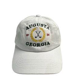 Augusta Georgia golf design embroidered on a unstructured dad baseball hat.  Customize you hat with your choice of color.  Design is embroidered as shown with thread colors as shown. Primary Color is the hat color.  Item Details: 100% cotton twill Pigment dyed Garment washed Low Profile 6 panel Brass buckle or Velcro adjustable strap One size fits most No returns or exchanges on customized items. Please contact me at any time for concerns about your purchase. Adjustable Collegiate Hat With Curved Visor, Collegiate Adjustable Baseball Cap With Curved Brim, Casual Golf Baseball Cap With Curved Bill, Casual Golf Baseball Cap With Curved Brim, Casual Curved Bill Baseball Cap For Golf, Collegiate Cotton Dad Hat With Curved Brim, Casual Baseball Cap With Curved Brim For Golf, Collegiate Dad Hat With Adjustable Fit, Casual Curved Brim Baseball Cap For Golf