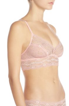 This sheer bralette looks cute (while being incredibly comfy) in slightly stretchy lace with a wide elastic band. 89% nylon, 11% spandex Hand wash, line dry Imported Lingerie Delicate Fitted Bra With Delicate Straps, Feminine Camisole Bra With Delicate Straps, Feminine Camisole Style Bra With Delicate Straps, Stretch Camisole Bra With Delicate Lace, Feminine Stretch Lace Bra, Feminine Low-cut Bra For Spring, Pink Feminine Bra With Delicate Lace, Feminine Pink Bra With Delicate Lace, Spring Lace Bra With Delicate Straps