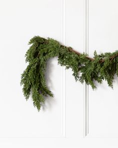 a close up of a wreath hanging on a door