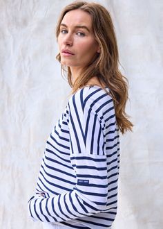 Elevate your French-girl game with this latest addition to our authentic Breton shirt collection! Tailored from our all-time best-seller shirt, MINQUIERS MODERNE, the MINQUIERS DROP features a more relaxed silouhette with dropped shoulders while maintaining the boyfriend fit and comfortable cotton we love. Made in Saint-James, Normandy, France. 100% lightweight cotton jersey. Breton Stripe Shirt, Breton Shirt, Stones Throw, Normandy France, The Boyfriend, Saint James, Shirt Collection, French Girl, Games For Girls