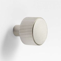 an image of a knob on a white wall