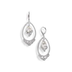 Starlit Enchantment Radiates From These Oval Crystal Cluster Orbital Drop Earrings From Jenny Packham. Set In Silver-Tone Mixed Metal Drop: 1-3/4" Leverback New With Tag Formal White Chandelier Earrings With Sparkling Stones, White Diamond Earrings With Diamond Accents For Party, Elegant Rose Cut Diamond Chandelier Dangle Earrings, White Chandelier Earrings With Diamond Accents For Party, Elegant White Chandelier Earrings With Diamond Accents, White Teardrop Earrings With Sparkling Stones For Formal Events, White Teardrop Earrings With Sparkling Stones For Formal Occasions, White Sparkling Teardrop Earrings For Formal Occasions, Elegant White Teardrop Earrings With Diamond Accents