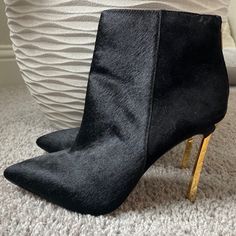 Black Calf Hair/Suede High Heel Bootie With Gold Metal Heel. New And Unworn. Size 9. Heel Is About 4 1/2 Inches Suede Almond Toe Party Boots, Suede Ankle Boot Booties For Party, Suede Ankle Booties For Party, Chic High Heel Calf Hair Shoes, Chic High Heel Calf Hair Heels, Chic Calf Hair Heels With Pointed Toe, Chic Calf Hair Pointed Toe Heels, Black Calf Hair Boots For Fall, Chic Calf Hair High Heels