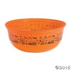 an orange bowl with halloween images on it