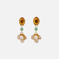 With playful colors, Jade, and hand-carved flowers, these Amber Earrings by Anita Berisha are lightweight and can be worn day to night. Materials: Cultured Freshwater Pearls, Glass Stones, Jade Beads, 12k Gold Fill, High Polished Brass with 14k Gold Plate. Measures: 2.25" Handmade in New York, USA Yellow Flower-shaped Party Earrings, Gold Flower-shaped Beaded Earrings, Elegant Yellow Dangle Flower Earrings, Elegant Orange Flower Earrings, Elegant Yellow Flower Shaped Earrings, Elegant Yellow Flower-shaped Earrings, Handmade Gold Pearl Earrings In Flower Shape, Elegant Gold Flower-shaped Beaded Earrings, Elegant Gold Flower Beaded Earrings