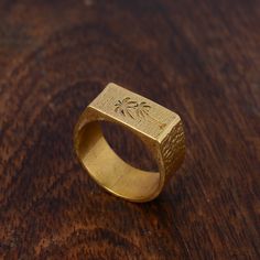 Engraved signet ring, Palm Tree Ring, Gold Signet Ring, Dainty Ring, Statement Ring, Tree signet ring, Hammered ring, Gold brass ring, Gifts Metal:- Brass ✦ Our rings are made of high-quality Brass metal and are carefully crafted by hand in our family workshop. The brass metal will develop a nice antique color over time. So, I suggest cleaning it once in a while for getting back to the shiny original color. You can use natural ingredients like lemon or vinegar with water to clean it. Also, apply a thin coat of transparent nail paint/nail enamel on the ring's inner side to save it from being tarnished. ❥ You may request to return the products, 15 days after you received the items (Delivery Day). The buyer is responsible for the shipping costs for the return. (We may have slower production a Brass Engraved Ring Tarnish Resistant For Gift, Tarnish Resistant Brass Engraved Ring For Gift, Engraved Brass Signet Ring As Gift, Tarnish Resistant Brass Signet Ring Gift, Brass Tarnish-resistant Signet Ring Gift, Etched Brass Rings For Gifts, Etched Brass Rings As Gifts, Minimalist Brass Signet Ring For Gift, Adjustable Rectangular Signet Ring As Gift