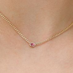 Capture the warmth of a summer sunset with this captivating Pink Sapphire Cuban Chain Necklace. A vibrant, oval-cut pink sapphire shimmers with a soft blush hue, nestled within a delicate yet bold 14k yellow gold Cuban Link chain (also available in white or rose gold). The contrast between the delicate gemstone and the modern chain creates a captivating and uniquely stylish piece. - Handmade - Solid Gold - Natural Pink Sapphire - Dimensions of the Setting: 6 x 4 - Total Sapphire Carat Weight: 0.30 ctw - The Dimension of the Links: 3 mm 🛠 Your Sarah Elise piece is handcrafted with care! Ready-to-ship items go out within 3 business days. Made-to-order pieces typically take 7-10 business days to create. If you need something sooner, please contact us - we'll see if we can make it happen! For Fine Jewelry Pink Oval Necklace, Pink Oval Fine Jewelry Necklaces, Pink Oval Fine Jewelry Necklace, Pink Birthstone Oval Pendant Jewelry, Pink Sapphire Necklace, Gold Curb Chain, Gold Cuban Link Chain, Cuban Chain Necklace, Solid Gold Bracelet