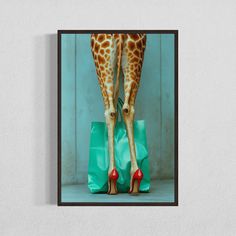 a giraffe's legs with red high heels and a green shopping bag