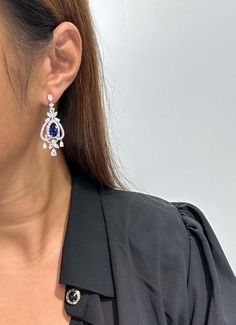 For Sale on 1stDibs - The Following Item we are offering is a Rare Important Radiant 18KT Gold Large Rare Fancy Blue Ceylon Sapphire and Diamond Earrings. Earrings are comprised Luxury Pear-shaped Earrings For Formal Events, Luxury Blue Pear-shaped Earrings, Luxury Pear-shaped Earrings For Formal Occasions, Luxury Pear-shaped Chandelier Earrings For Formal Events, Formal Cubic Zirconia Bridal Earrings, Luxury Blue Chandelier Earrings For Formal Occasions, Formal Bridal Earrings With Cubic Zirconia, Luxury Sapphire Drop Jewelry, Elegant Pear-shaped Chandelier Earrings For Formal Occasions