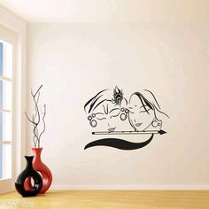 a wall decal with an image of a couple kissing