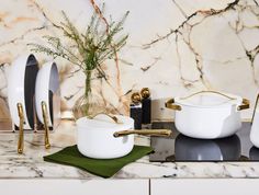 the kitchen counter is clean and ready to be used as a place setting for dinner