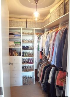 the closet is full of clothes and shoes