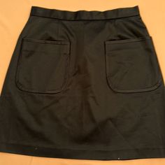 Elizabeth And James. Black Mini Skirt. Back Zipper. Side S. Excellent Condition. Never Worn. Retro High Waisted Black Mini Skirt, Retro High Waist Black Mini Skirt, Retro High-waisted Black Mini Skirt, Retro Black Mini Skirt, Retro Black Mini Skirt With Lining, Fitted Black Skirt With Side Pockets, Black Skirt With Side Pockets, Retro Black Skirt, Black Relaxed Skort With Pockets