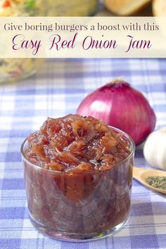 an onion and onion paste in a glass bowl on a table next to onions, garlic and seasoning