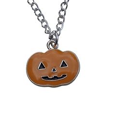 Orange enamel jack o'lantern necklace with black cutout face, According to the folklore depicted on this Jack O'Lantern pendant necklace, Jack O'Lantern was actually a human being. Orange enamel metal alloy Jack-O'-Lantern pendant, measuring 0.6 by 0.7 inches (15 by 18 centimeters) Length of 18-inch necklace (45 cm) A silver-toned necklace Chain that can be lengthened by another two inches (five centimeters) Height is customizable up to 20 inches (51 cm) Fastened with a receptacle like a lobster Orange Necklace For Halloween Gift, Halloween Themed Silver Necklaces, Themed Silver Necklaces For Halloween, Silver Themed Necklace For Halloween, Silver Themed Halloween Necklace, Spooky Orange Jewelry Gift, Spooky Orange Jewelry For Gifts, Spooky Orange Halloween Jewelry, Halloween Nickel-free Pendant Necklace