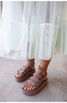 This sporty gladiator sandal revamp is boosted by a chunky platform sole, hook-and-loop closures and a removable ankle strap for added versatility. 1 3/4" platform Textile and leather upper and lining/rubber sole Imported Teva Mevia Flatform Outfit, Uggs Sandals Outfit, Cute Comfy Sandals, Summer Sandals 2024, Sandals 2024 Trends, Platform Teva, Platform Tevas, Platform Sandal Outfit, Summer Sandals Outfit