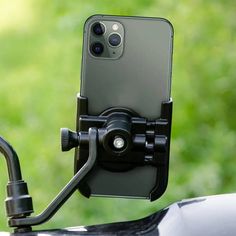 an iphone is attached to a bike handlebar