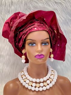 Get ready to make a statement with the African Traditional Hat Gele, a must-have accessory for any fashion-forward individual. Handmade with care, this pre-tied and ready-to-wear hat is available in multiple colors to match any outfit.  Whether you're attending a wedding, as the bride, bridesmaid, mother of the bride, or simply as a guest, this hat will add an extra touch of elegance and style to your look.  So why wait? Add some African flair to your wardrobe today with the African Traditional Hat Gele! Wax Photos, Faux Fur Handbag, Fur Handbags, Handmade African, African Fabric, Head Covering, African Fashion, Mother Of The Bride, Scarf Wrap