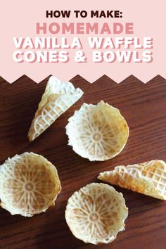 four pieces of peeled orange sitting on top of a wooden table next to each other