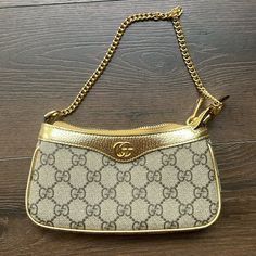 Gucci Ophidia Mini Bag, Never Worn, Excellent Condition, Comes With Two Dust Bags In Gold And Gg Supreme Canvas Gold Monogram Canvas Bag With Gold-tone Hardware, Gold Monogram Canvas Bag With Detachable Strap, Gold Monogram Canvas Shoulder Bag With Dust Bag, Gold Monogram Canvas Bag With Branded Hardware, Luxury Gold Monogram Canvas Shoulder Bag, Gold Monogram Canvas Bags With Branded Hardware, Gold Monogram Canvas Shoulder Bag, Gucci Clutch Shoulder Bag With Gold-tone Hardware, Gold Monogram Canvas Top Handle Shoulder Bag