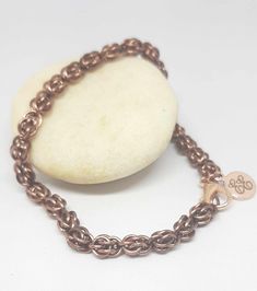 This Sweet Pea weave bracelet is handwoven using 20G antique copper enamel coated copper jump rings and is available in two different widths.  This is the smaller version of this bracelet and is approximately 3/16" (5mm) wide.  The standard length of most bracelets is 7.5"; however, we offer multiple lengths, so please make sure to select your desired bracelet length.  Other lengths are available by special order. Chainmail Jewelry, Mom And Sister, Woven Bracelets, Chain Mail, Jewelry Bracelet, Fashion Mode, Sweet Pea, Jump Rings, Antique Copper