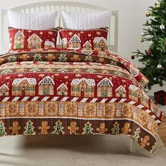 a christmas themed bed set with gingerbread houses