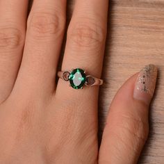 It is lab emerald ring. The main stone is 7mm*9 mm oval cut.weight about 1.58 carats. The basic metal is sterling silver and plated with rhodium. To change the metal to a solid gold (white/rose) or platinum is also available, please ask for a quotation if you want. You can also go to my shop Home for more elegant rings: https://www.etsy.com/shop/godjewelry?ref=hdr_shop_menu Emerald is May birthstone More emerald rings: https://www.etsy.com/shop/godjewelry?section_id=20709240 Customization is alw Emerald Oval Cabochon Ring As A Gift, Green Oval Jewelry With Bezel Setting, Dainty Oval Solitaire Emerald Ring, Oval May Birthstone Ring Gift, Elegant Green Opal Oval Ring, May Birthstone Ring For Gift, Dainty Oval May Birthstone Jewelry, Oval Sterling Silver Emerald Promise Ring, Oval Emerald Sterling Silver Promise Ring