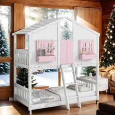 a white bunk bed with pink shutters on the top and bottom, in front of a christmas tree