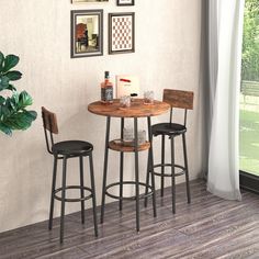 three stools and a table in a room