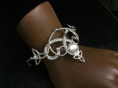 I will fabricate this complete romantic and Renaissance, boho inspired bridal set, in sterling silver, with a feminine and Celtic take on some Irish classic designs! I make everything in sterling silver, at my bench studio, and each piece is forged and fabricated one-at-a-time, by my hand only...nothing is pre-manufactured or made elsewhere! So, because of this, please allow me proper time to complete the set and ship in plenty of time for hair trials, etc. as I want to ensure I am not rushed an Elegant Moonstone Jewelry For Festivals, Artisan Adjustable Wedding Jewelry, Artisan Adjustable Jewelry For Wedding, Bohemian Silver Jewelry For Wedding, Spiritual Sterling Silver Bracelet For Weddings, Artisan Bracelet Jewelry For Wedding, Adjustable Round Sterling Silver Bracelet For Wedding, Moonstone Wedding Bracelet Jewelry, Unique Silver Bracelets For Wedding