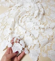 Beautiful Quipure Rayon lace fabric This is a new style in  high quality.  Great for wedding dress, evening gown, Costume, cocktail dress Color: White Width - 51inches, Length - by Yard Wholesale acceptable, please convo me Shipping Time: United Sates: 10-15 working days United Kingdom:10-15 working days Canada: 10-15working days Australia: 10-15 working days Asia:4-8 working days Europe: 10-20 working days need express mail service , please contact us Crochet Lace Fabric For Wedding, Lace Patchwork Fabric For Wedding, White Crochet Lace For Ceremony, White Crochet Lace For Ceremonies, White Lace Fabric For Wedding, White Lace Wedding Fabric, White Lace With Floral Embroidery Fabric, White Wedding Fabric With Lace Work, White Lace Fabric