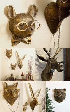 there are many different pictures of deer heads on the wall, and one is wearing glasses