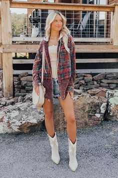 - Take a stroll through the orchard in this charming lightweight jacket! With its plaid print and vintage wash, it perfectly captures that cozy fall vibe. From your morning coffee run to an apple-picking adventure, this piece is sure to keep you on-trend. - Unlined material with a navy, ivory, and red hued plaid print and a vintage wash - Oatmeal colored waffle knit accents - Unfinished seam accents - A collared neckline with a removable hood featuring a functional drawstring that buttons on to Garden Party Dresses, Babydoll Tops, Suede Cowboy Boots, Winter Formal Dresses, Coffee Run, Oatmeal Color, Falling Leaves, Apple Picking, Distressed Shorts