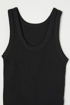 Casual Seamless Crew Neck Tank Top, Classic Scoop Neck Tops For Layering, Scoop Neck Tank Top With Ribbed Neckline For Everyday, Everyday Scoop Neck Tank Top With Ribbed Neckline, Casual Tops For Loungewear With Scoop Back, Casual Loungewear Tops With Scoop Back, Casual Scoop Back Top For Loungewear, Classic Scoop Neck Tank Top, Crew Neck Tank Top For Layering With Ribbed Neckline