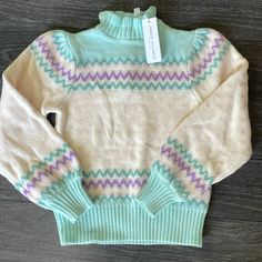 New With Tags Janie And Jack Fair Isle Sweater. Long Sleeve. Size 7. Colors Are Teal, Light Pink, Purple And White. Three Buttons In The Back. Janie And Jack, Jack White, Fair Isle Sweater, Fair Isle, Colorful Sweaters, Kids Shirts, Sweater Top, Light Pink, Shirts Tops