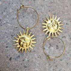 Sun Hoop Earrings,Hoop earring,Bohemian earring,Raw Brass,Sonne Ohrringe,Gift to Her,Sun Hoops,Celestial,Dainty,Antique brass,Sunburst This listing is for 1 pair of earrings: Sun pendants are dangle in raw brass hoops: Perfect as a gift to your friend or the little extra for yourself! They are lightweight *Raw brass ear hoops 20mm nickel free, lead free Please make sure to read my Terms, Conditions and Shipping Information before committing to purchase: http://www.etsy.com/shop/AngelPearls/polic Sun Hoop Earrings, Adjustable Brass Sun And Moon Design Jewelry, Brass Earrings With Sun And Moon Design For Festival, Brass Sun And Moon Design Earrings For Festival, Brass Sun And Moon Festival Earrings, Handmade Celestial Earrings For Festivals, Celestial Brass Jewelry With Sun Design, Celestial Sun Design Brass Jewelry, Adjustable Brass Jewelry With Sun Design