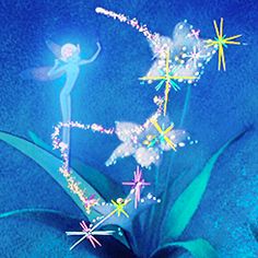 a blue flower with stars on it and a fairy figure in the center, surrounded by other flowers